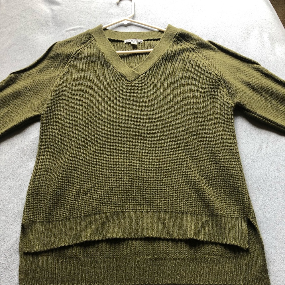 Dark green knitted sweater